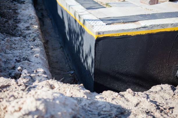 Professional Waterproofing technician working in Rudolph, OH